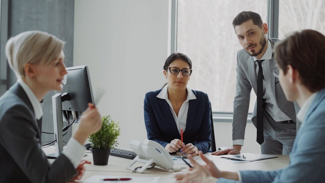 office workers discussing job satisfaction
